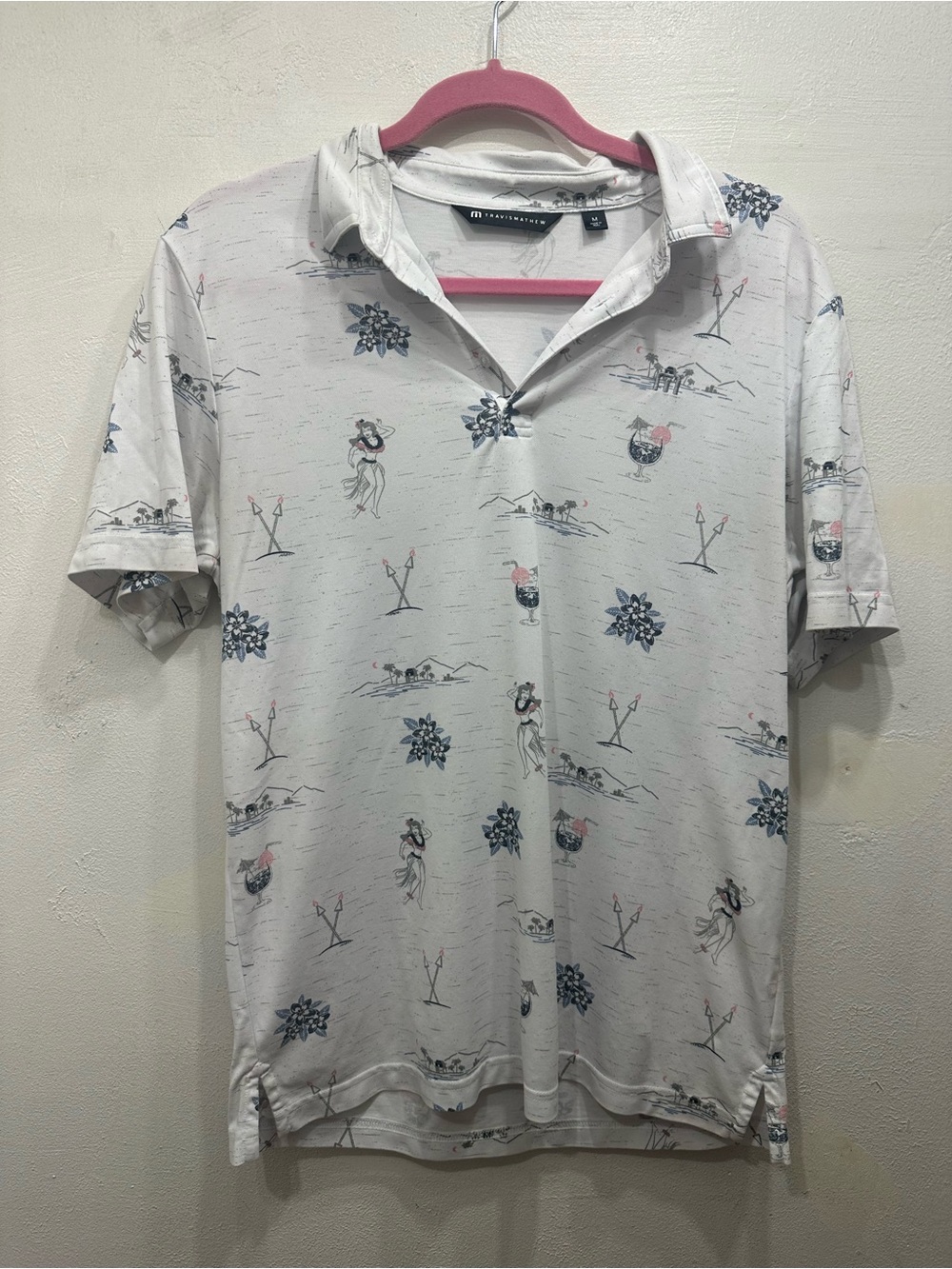 TravisMathew White Polo with Blue Floral and Pink Accent Print
